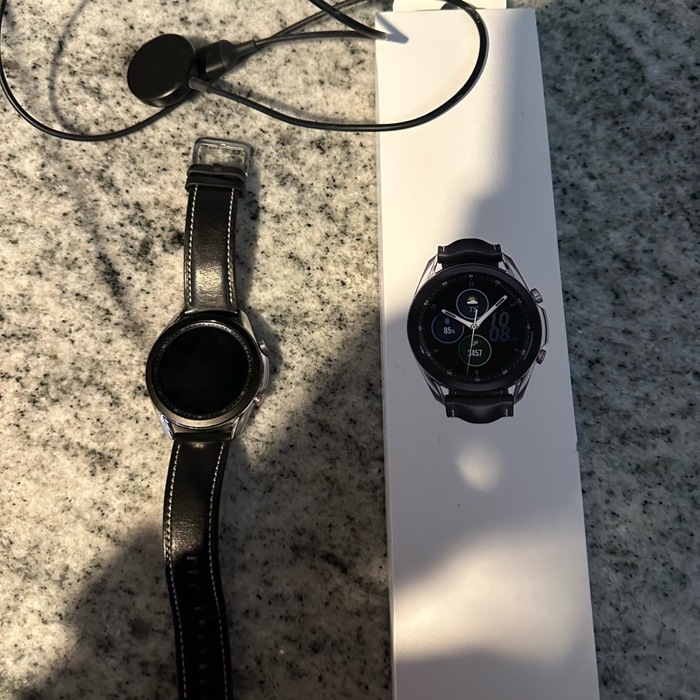 Samsung Galaxy Watch3 with charger.  Barely used.  Some wear.